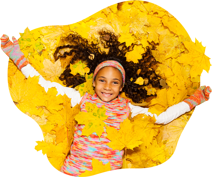 Girl holding book 'Healthy & Ready to Learn'